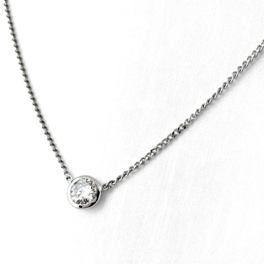 DIAMOND DESIGN NECKLACE PLATINUM PENDANT NECKLACE: Diamond Design Necklace Platinum Pendant Necklace Brand: Unbranded Type/Style: Necklace Material: Pt850, Main Stone Natural Color: None Size: 6.1x6.0mm(0.2") Accessories: None Accessories Notice: