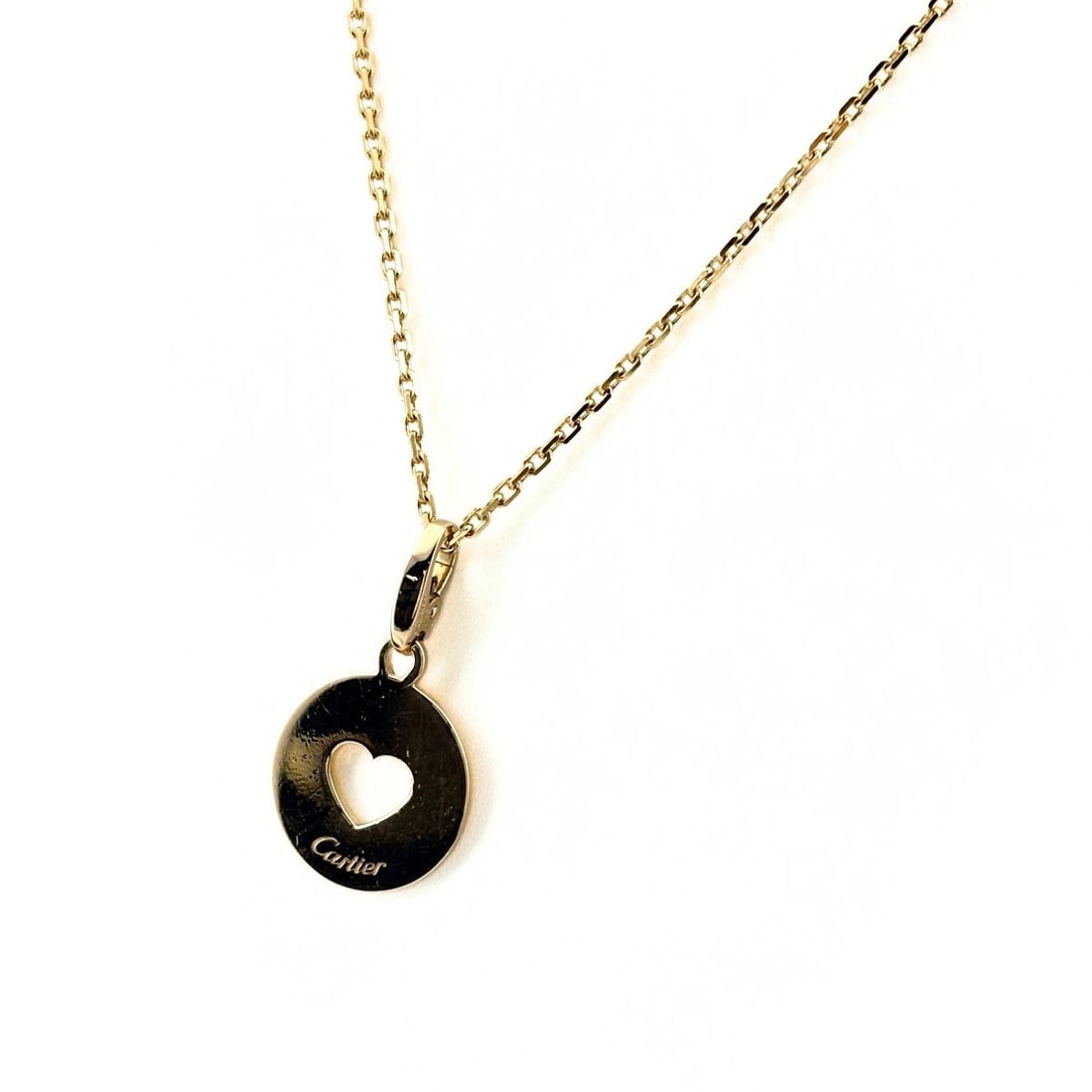 CARTIER HEART MEDAL YG PENDANT NECKLACE 750: Cartier Heart Medal Yg Pendant Necklace 750 Brand: CARTIER Type/Style: Necklace Material: 750YG, Main Stone None Color: YG Size: 42cm(16.5") Accessories: None Accessories Notice: When purchasing