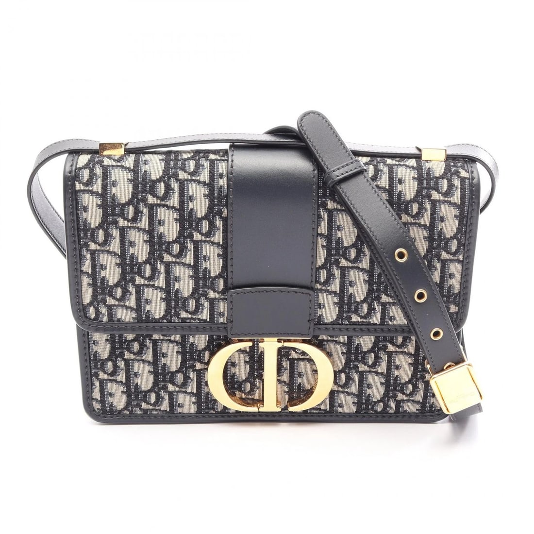 CHRISTIAN DIOR MONTAIGNE SHOULDER CROSSBODY BAG: Christian Dior MONTAIGNE Shoulder crossbody Bag Brand: DIOR Type/Style: Shoulder Bag Material: canvas ? leather Color: Beige?ish colors ? Navy?ish colors Size: (H:7.1inch x W:9.4inch x D:2.8inch)