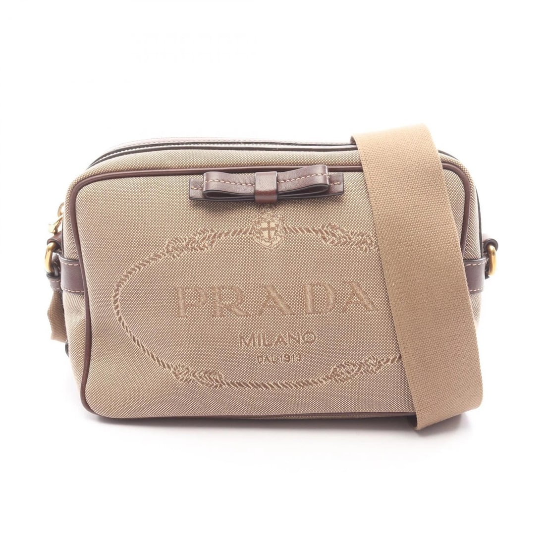 PRADA LOGO JACQUARD CROSSBODY SHOULDER BAG: PRADA LOGO JACQUARD crossbody Shoulder Bag Brand: PRADA Type/Style: Shoulder Bag Material: canvas ? leather Color: Beige?ish colors ? Brown?ish colors Size: (H:5.9inch x W:8.7inch x D:3.1inch) Acc