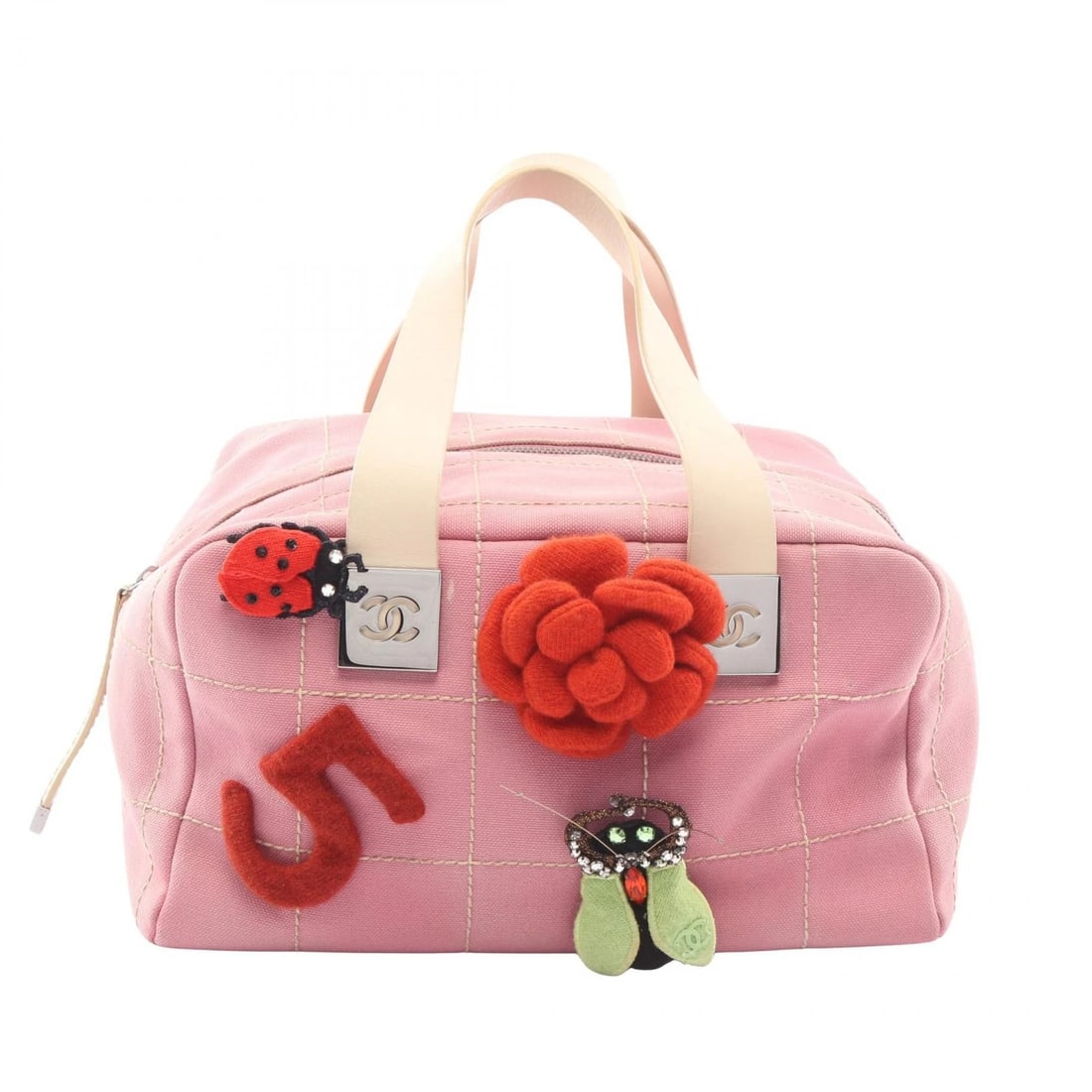 CHANEL CHOCOLATE BAR CAMELLIA HANDBAG: CHANEL Chocolate Bar Camellia Handbag Brand: CHANEL Type/Style: Handbag Material: canvas ? leather Color: Pink?ish colors ? Beige?ish colors Size: (H:5.9inch x W:11.0inch x D:7.9inch) Accessories: