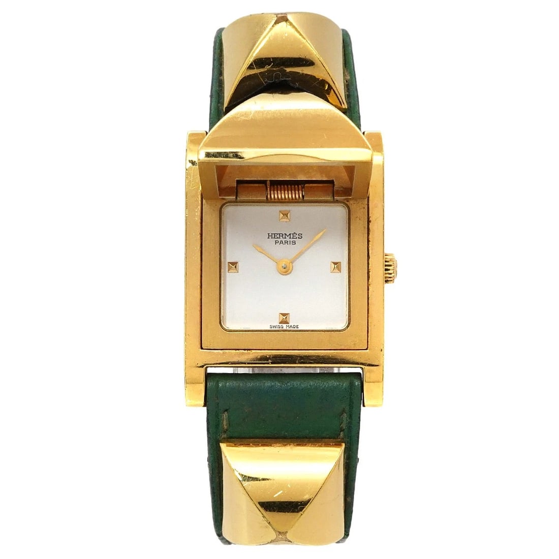 HERMES MEDOR PYRAMID GOLD STUDS QUARTZ WHITE DIAL WATCH: HERMES Medor pyramid Gold studs Quartz White Dial Watch Brand: HERMES Type/Style: Wristwatch Material: Stainless steel,Leather Color: Dial Color White Size: CaseSize Length 32mm(included lag)