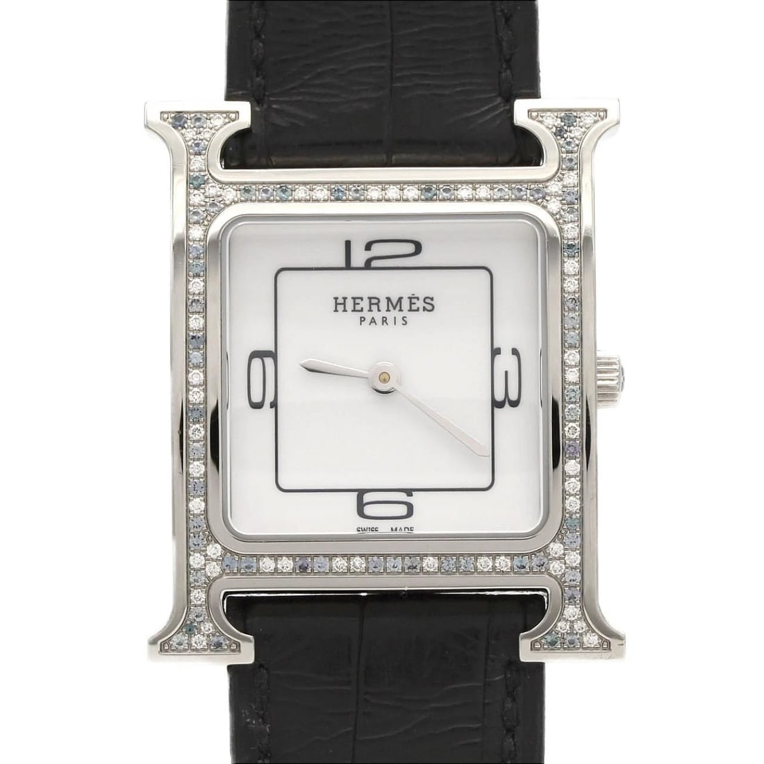 HERMES H-WATCH STAINLESS WATCH: Hermes H-Watch Stainless Watch Brand: HERMES Type/Style: Wrist watch Material: Case: Stainless Steel Bracelet: Strap Color: Dial Color: White Band Color: Black Size: Case diameter: 26.5 x 35 Acces