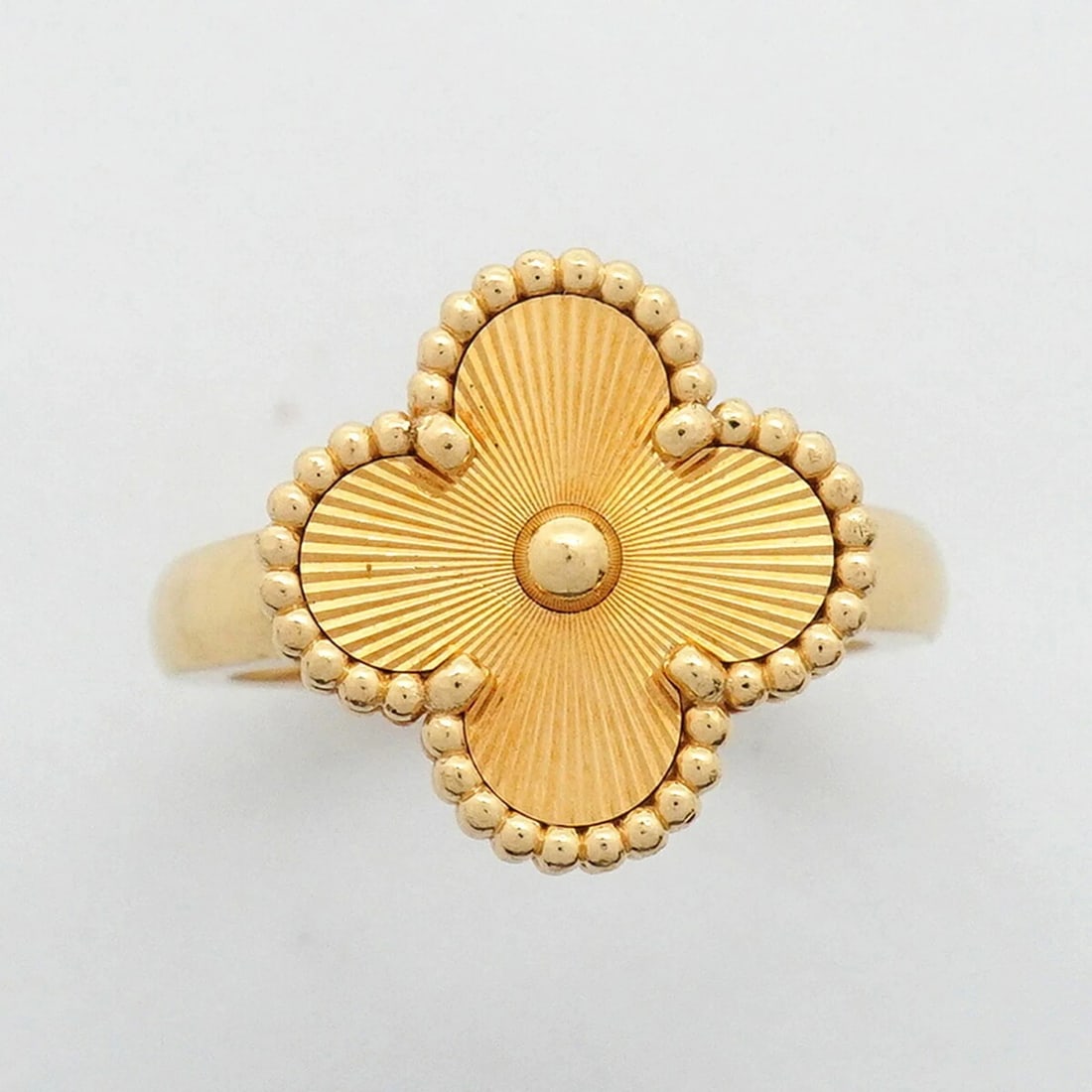 VAN CLEEF & ARPELS ALHAMBRA GUILLOCHE RING (1 of 2)