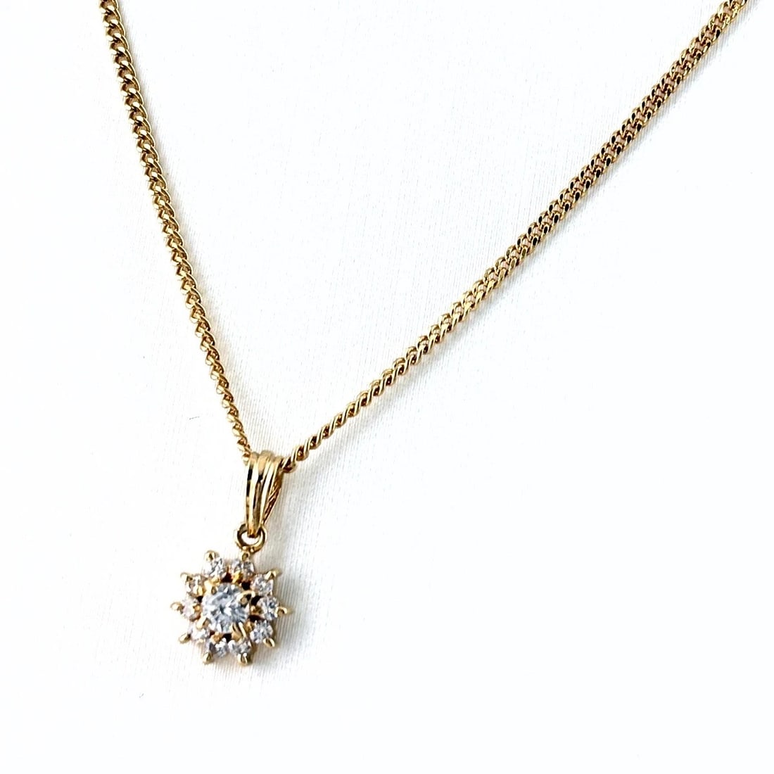 MELEE DIAMOND DESIGN NECKLACE YG PENDANT NECKLACE: Melee Diamond Design Necklace Yg Pendant Necklace Brand: Unbranded Type/Style: Necklace Material: 18K YG, Main Stone Natural Color: YG Size: 12.8x6.7mm(0.5") Accessories: None Accessories Notice: