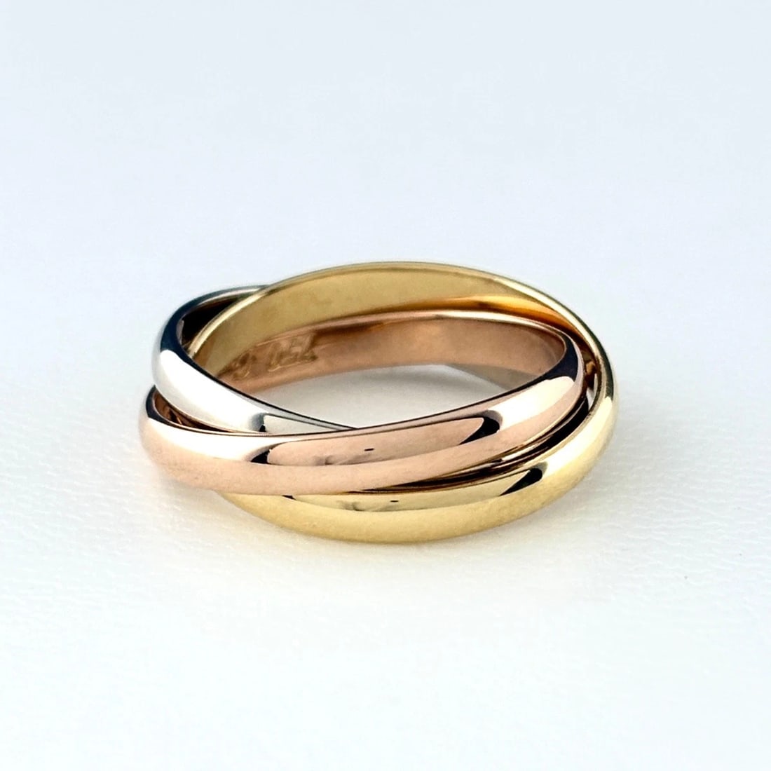 CARTIER TRINITY YG RING 750: Cartier Trinity Yg Ring 750 Brand: CARTIER Type/Style: Ring Material: 750YG, Main Stone None Color: YG Size: US5 to 5.5 Accessories: None Accessories Notice: When purchasing pre-owned goods, please