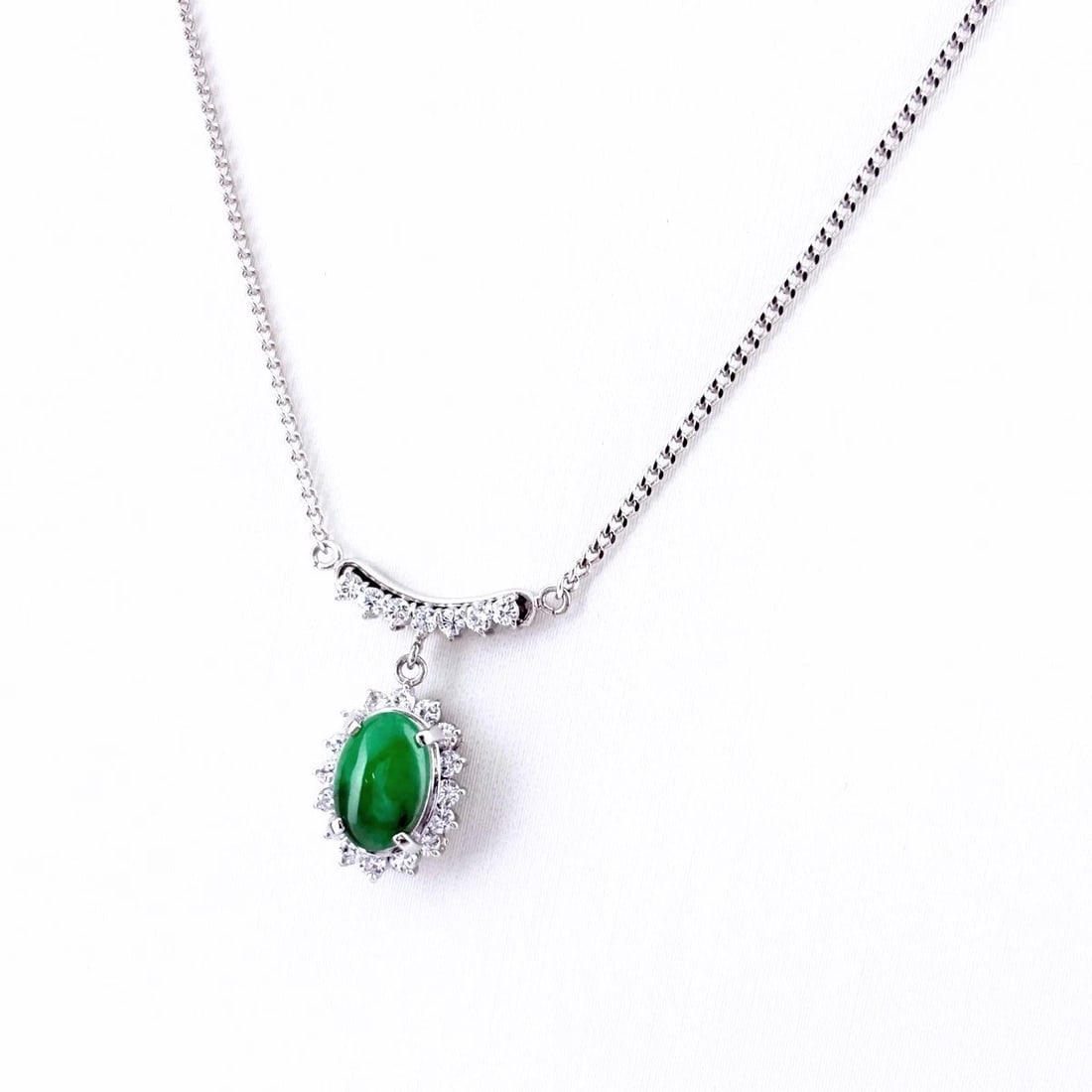 JADE DESIGN NECKLACE PLATINUM PENDANT MELEE NECKLACE: Jade Design Necklace Platinum Pendant Melee Necklace Brand: Unbranded Type/Style: Necklace Material: Pt900, Main Stone Jade /Secondary Stone:Natural Color: None Size: 18.3x11.6mm(0.7") Accessories