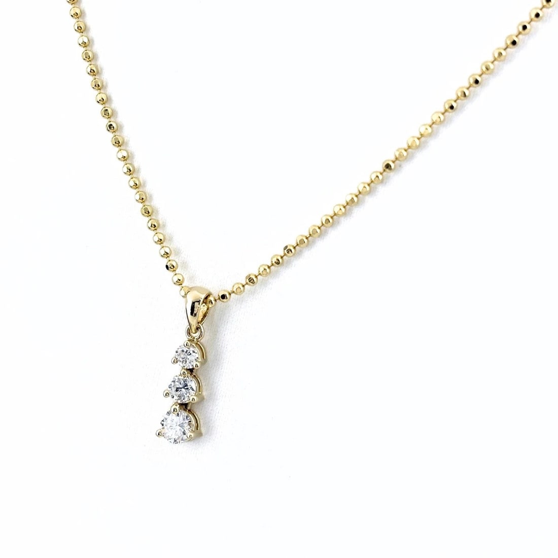 MELEE DIAMOND DESIGN NECKLACE YG PENDANT NECKLACE: Melee Diamond Design Necklace Yg Pendant Necklace Brand: Unbranded Type/Style: Necklace Material: 18K YG, Main Stone Natural Color: YG Size: 17.9x4.8mm(0.7") Accessories: None Accessories Notice: