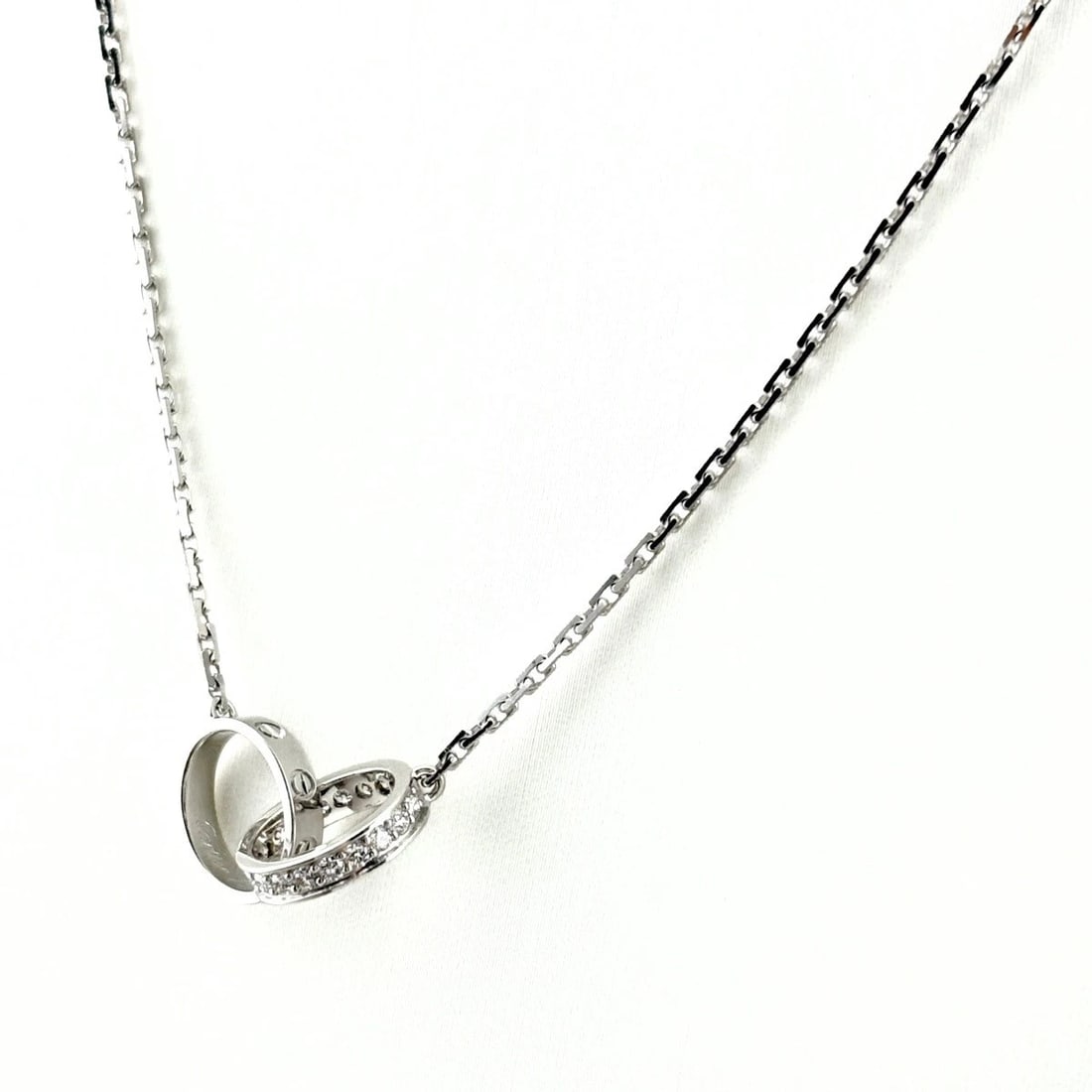 CARTIER BABY LOVE DIAMOND NECKLACE MELEE PENDANT: Cartier Baby Love Diamond Necklace Melee Pendant Brand: CARTIER Type/Style: Necklace Material: 750, Main Stone Natural Color: None Size: 19.3x9.5mm(0.8") Accessories: None Accessories Notice: When