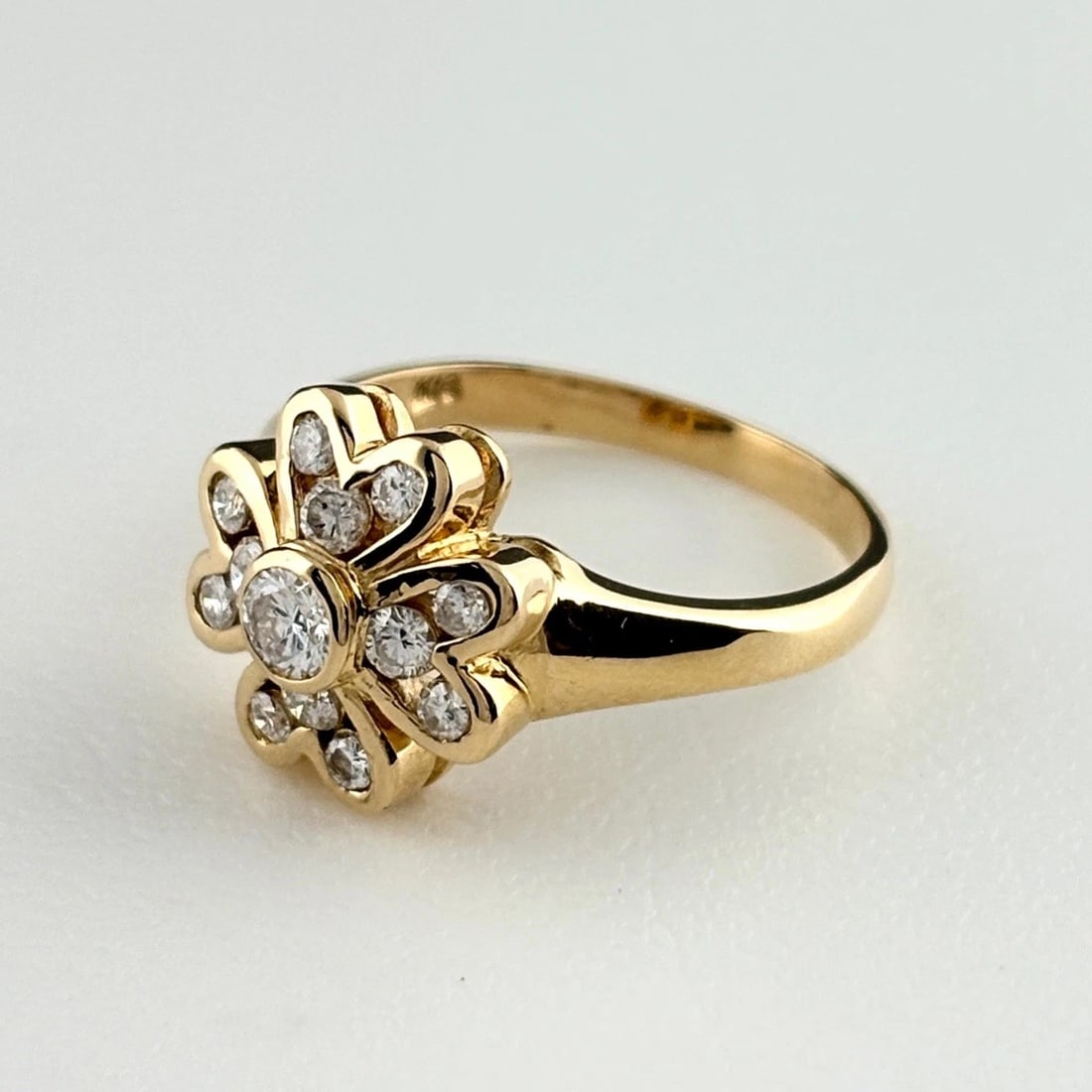 FLOWER MOTIF DESIGN RING YG MELEE DIAMOND FLOWER RING: Flower Motif Design Ring Yg Melee Diamond Flower Ring Brand: Unbranded Type/Style: Ring Material: 18K YG, Main Stone Natural Color: YG Size: US6 Accessories: None Accessories Notice: When purchasing
