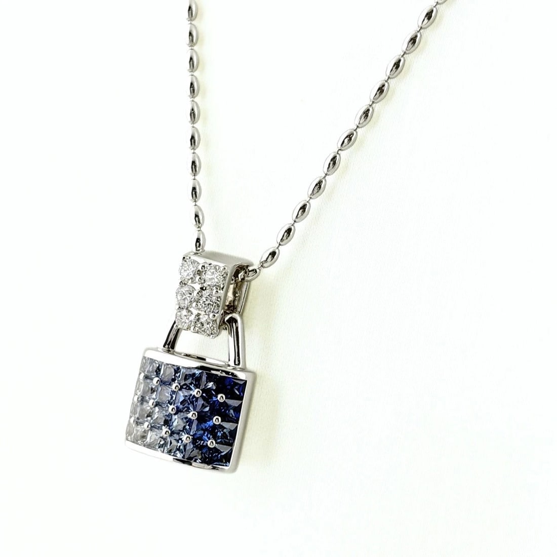 JEUNET SAPPHIRE NECKLACE WG PENDANT MELEE DIAMOND: Jeunet Sapphire Necklace Wg Pendant Melee Diamond Brand: Jeunet Type/Style: Necklace Material: 18K WG, Main Stone Sapphire /Secondary Stone:Natural Color: WG Size: 22.1x12.9mm(0.9") Accessories: None