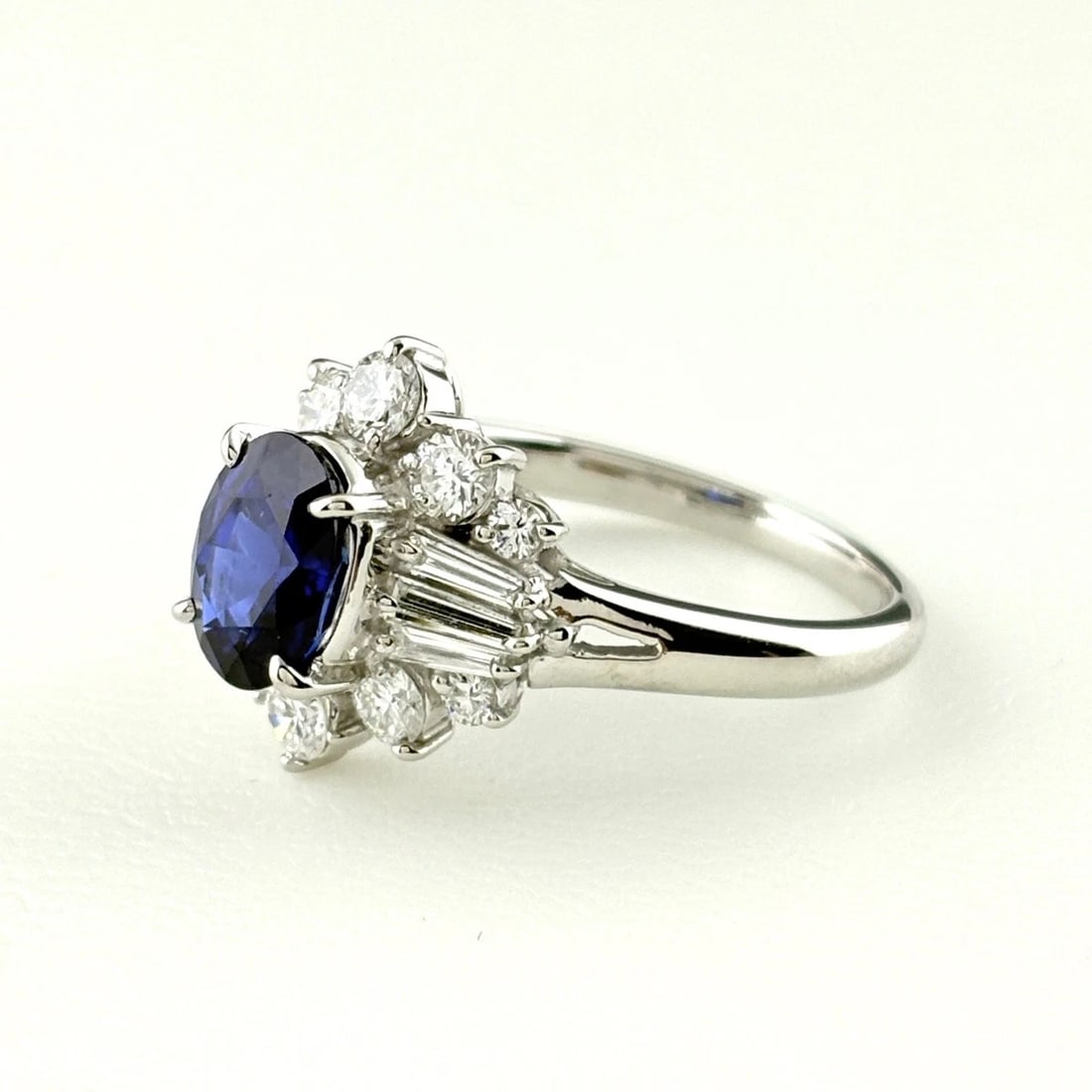 SAPPHIRE DESIGN RING PLATINUM MELEE DIAMOND RING: Sapphire Design Ring Platinum Melee Diamond Ring Brand: Unbranded Type/Style: Ring Material: Pt900, Main Stone Sapphire /Secondary Stone:Natural Color: None Size: US6 Accessories: None Acc