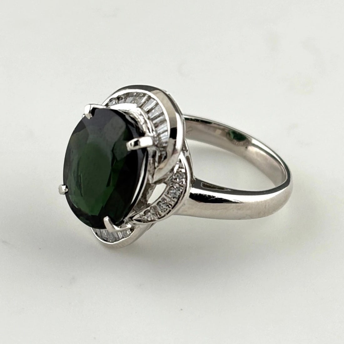 TOURMALINE DESIGN RING PLATINUM MELEE DIAMOND RING: Tourmaline Design Ring Platinum Melee Diamond Ring Brand: Unbranded Type/Style: Ring Material: Pt900, Main Stone Tourmaline /Secondary Stone:Natural Color: None Size: US6 to 6.5 Accessories: None