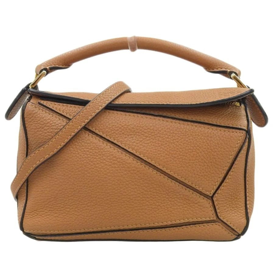 LOEWE BAG: PUZZLE MINI LIGHT BROWN: LOEWE Bag: Puzzle Mini Light Brown Brand: LOEWE Type/Style: Shoulder Bag Material: Exterior Material Leather Color: Exterior Color Brown Size: (approx. W6.5 ? H4.1 ? D3.0 inch) Accessories: None