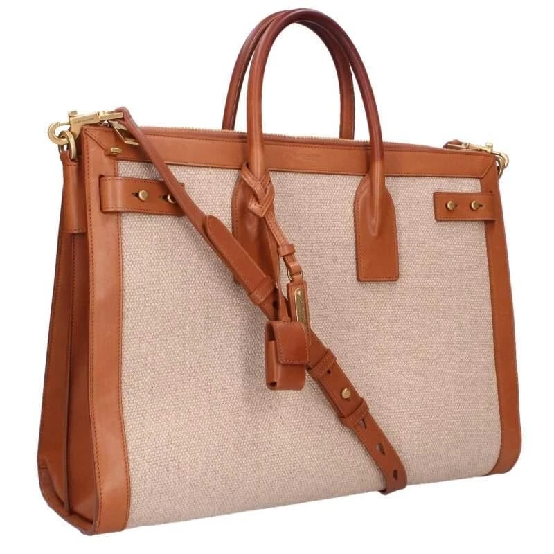 SAINT LAURENT PARIS BAG: CANVAS TOTE BROWN: SAINT LAURENT PARIS Bag: Canvas Tote Brown Brand: SAINT LAURENT PARIS Type/Style: Tote Material: Exterior Material Canvas Color: Exterior Color Brown Beige Size: (approx. W15.4 ? H11.6 ? D4.9 inch)