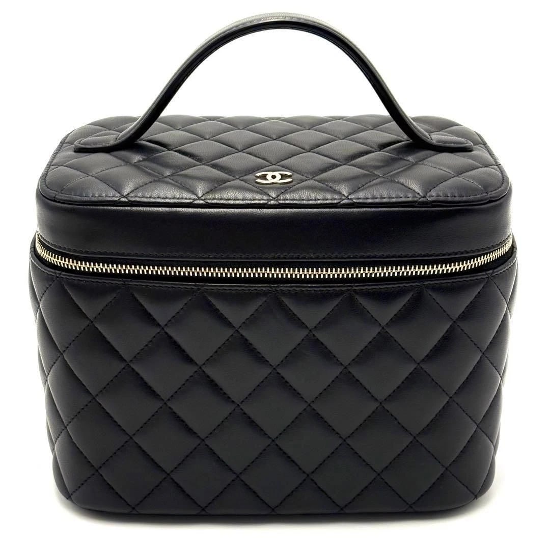 CHANEL BAG: VANITY LOGO BLACK: CHANEL Bag: Vanity Logo Black Brand: CHANEL Type/Style: Top Handle Bag Material: Exterior Material Leather Color: Exterior Color Black Size: (approx. W8.1 ? H5.5 ? D5.1 inch) Accessories: None