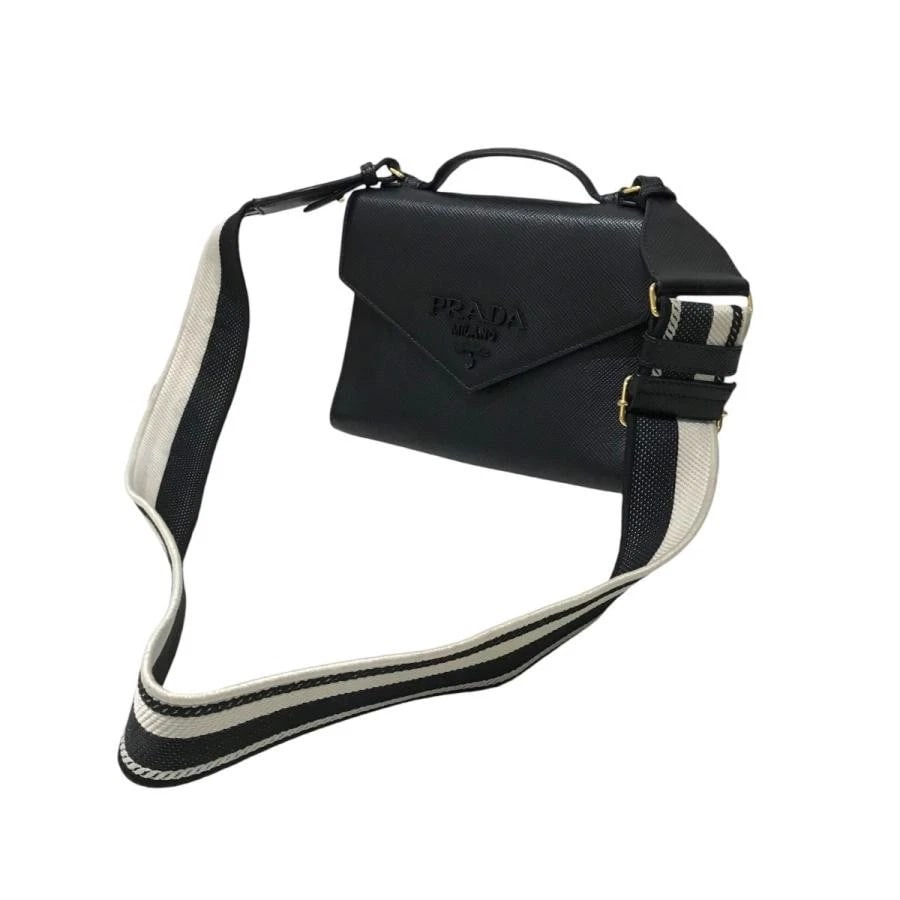 PRADA BAG: MONOCHROME: PRADA Bag: Monochrome Brand: PRADA Type/Style: Shoulder Bag Material: Exterior Material Leather Color: Exterior Color Black Size: (approx. W6.3 ? H8.3 ? D2.0 inch) Accessories: None Access