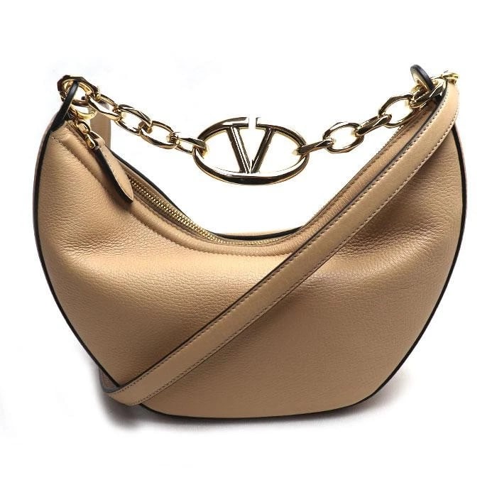 VALENTINO GARAVANI BAG: V LOGO HOBO MOON: VALENTINO GARAVANI Bag: V Logo Hobo Moon Brand: Valentino Garavani Type/Style: Shoulder Bag Material: Exterior Material Leather Color: Exterior Color Beige Size: (approx. W11.0 ? H4.3 ? D4.3 inch)