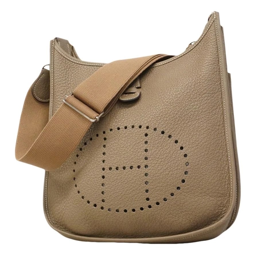 HERMES BAG: EVELYNE: HERMES Bag: Evelyne Brand: HERMES Type/Style: Shoulder Bag Material: Exterior Material Leather Color: Exterior Color Etoupe Size: (approx. W11.0 ? H10.6 ? D3.1 inch) Accessories: None Accessories