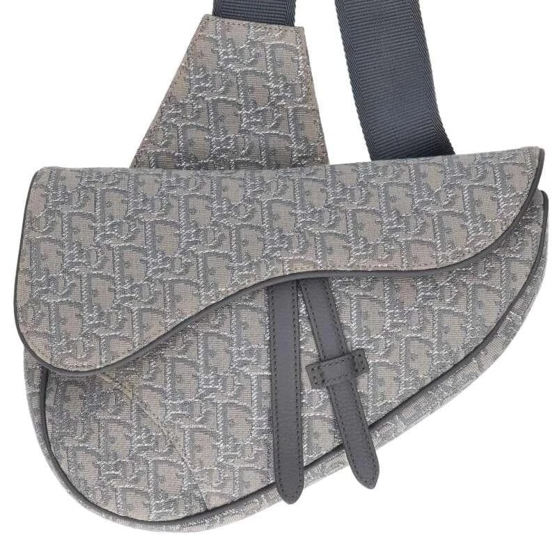 DIOR BAG: SADDLE OBLIQUE JACQUARD LAME STITCH GRAY: DIOR Bag: Saddle Oblique Jacquard Lame Stitch Gray Brand: DIOR Type/Style: Shoulder Bag Material: Exterior Material Jacquard Color: Exterior Color Gray Size: (approx. W10.4 ? H7.1 ? D0.8 inch)