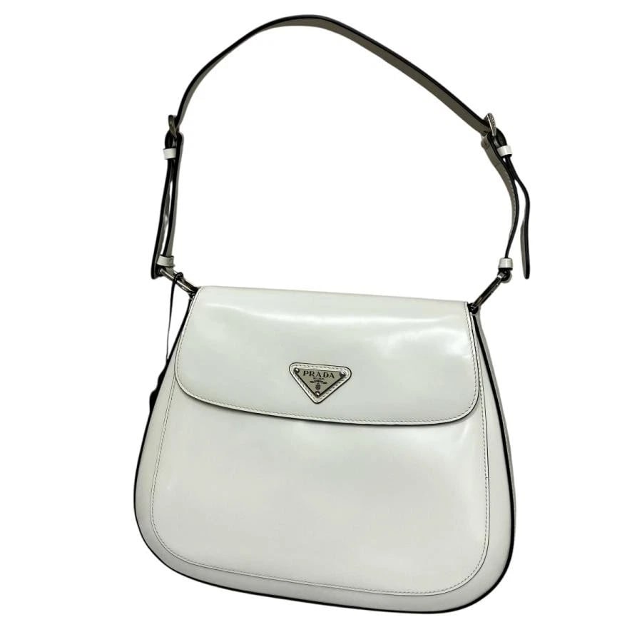 PRADA BAG: CLEO WHITE: PRADA Bag: Cleo White Brand: PRADA Type/Style: Shoulder Bag Material: Exterior Material Leather Color: Exterior Color White Size: approx. W11.4 ? H9.4 ? D1.6 inch) Accessories: None Access