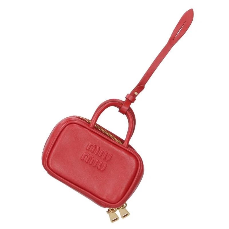 MIU MIU BAG: LOGO EMBOSSED MICRO BAG CHARM RED W/DUST BAG: MIU MIU Bag: Logo Embossed Micro Bag Charm Red w/dust bag Brand: MIU MIU Type/Style: Dust bag Material: Exterior Material None Color: Exterior Color Red Size: (approx. W4.1 ? H2.6 ? D1.4 inch)