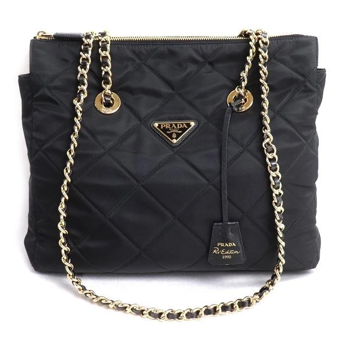 PRADA BAG: RE-EDITION BLACK: PRADA Bag: Re-Edition Black Brand: PRADA Type/Style: Shoulder Bag Material: Exterior Material Nylon Color: Exterior Color Black Size: (approx. W12.2 ? H8.7 ? D3.1 inch) Accessories: None Accessories
