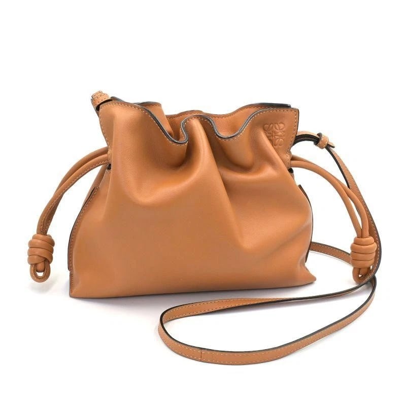 LOEWE BAG: FLAMENCO CLUTCH MINI: LOEWE Bag: Flamenco Clutch Mini Brand: LOEWE Type/Style: Clutch Material: Exterior Material Leather Color: Exterior Color Gold Size: (approx. W8.9 ? H7.9 ? D2.8 inch) Accessories: None Accessories