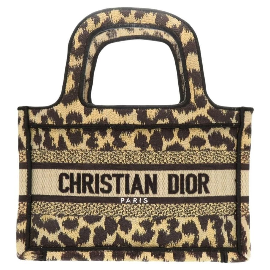 CHRISTIAN DIOR BAG: BOOK TOTE MINI LEOPARD BEIGE: CHRISTIAN DIOR Bag: Book Tote Mini Leopard Beige Brand: Christian Dior Type/Style: Tote Material: Exterior Material Canvas Color: Exterior Color Beige Size: (approx. W9.1 ? H5.9 ? D2.8 inch) Acces