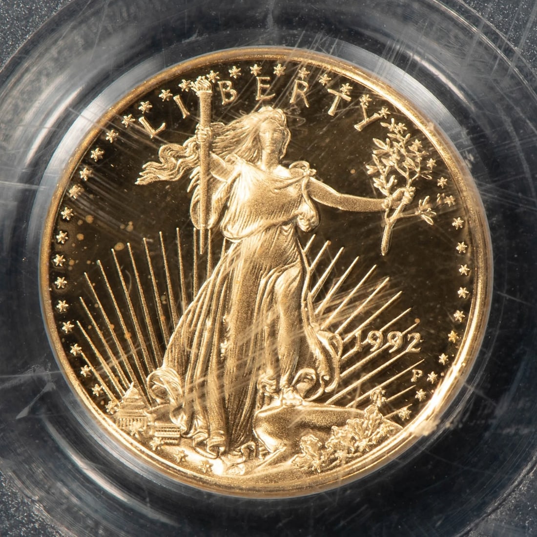 1992-P G$5 1/10 OZ GOLD AMERICAN EAGLE PROOF: 1992-P G$5 1/10 oz Gold American Eagle Proof Brand/Mint: U.S. Mint Year: 1992 Fineness: 0.9167 Country of Origin: United States Accessories: None Accessories Notice: When purchasing pre-owned goods