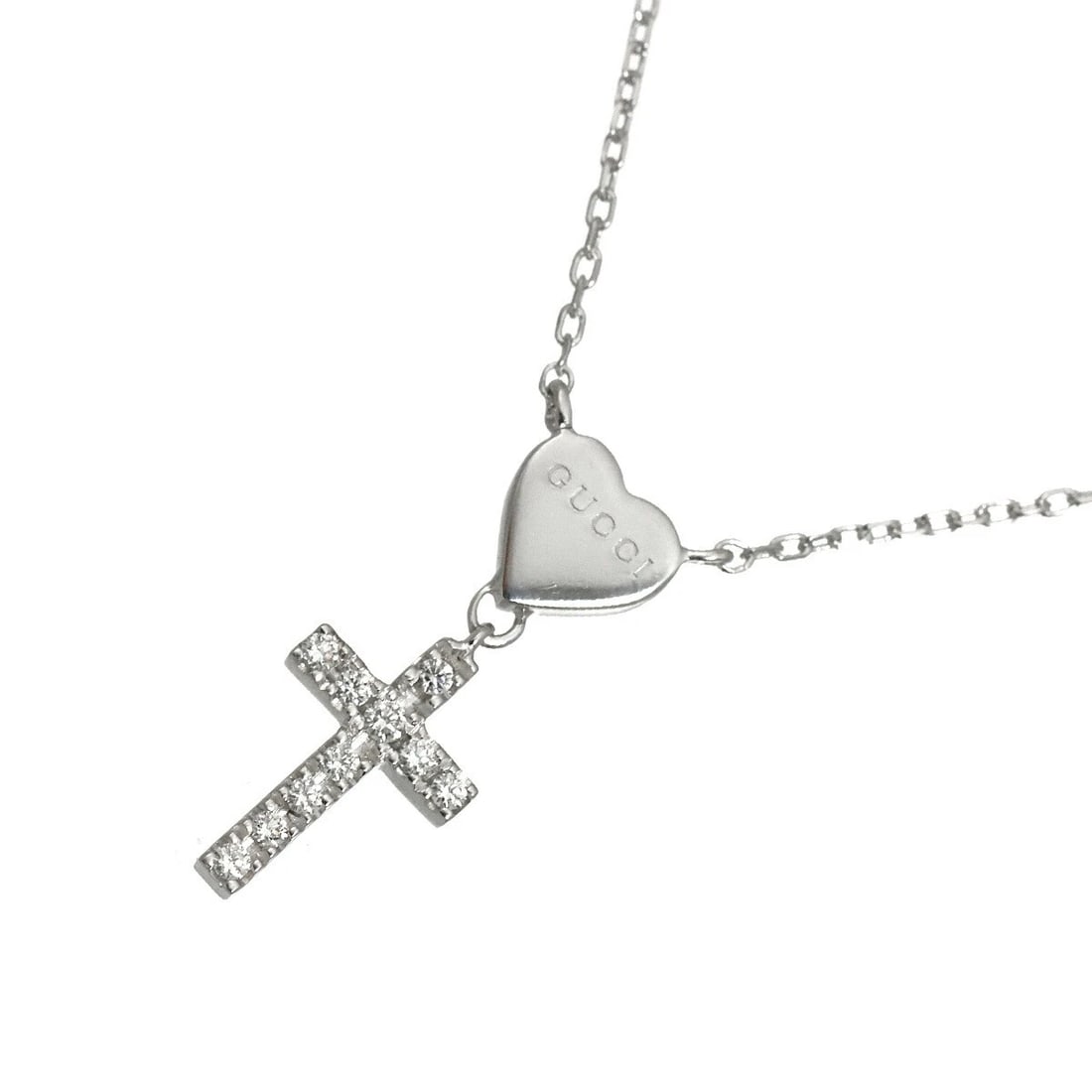 GUCCI HEART CROSS DIAMOND NECKLACE: GUCCI Heart Cross Diamond Necklace Brand: GUCCI Type/Style: Necklace Material: 750 White Gold, Main Stone Natural Color: White Gold Size: internal circumference of the chain:17.7inch to 16.5inch Top C