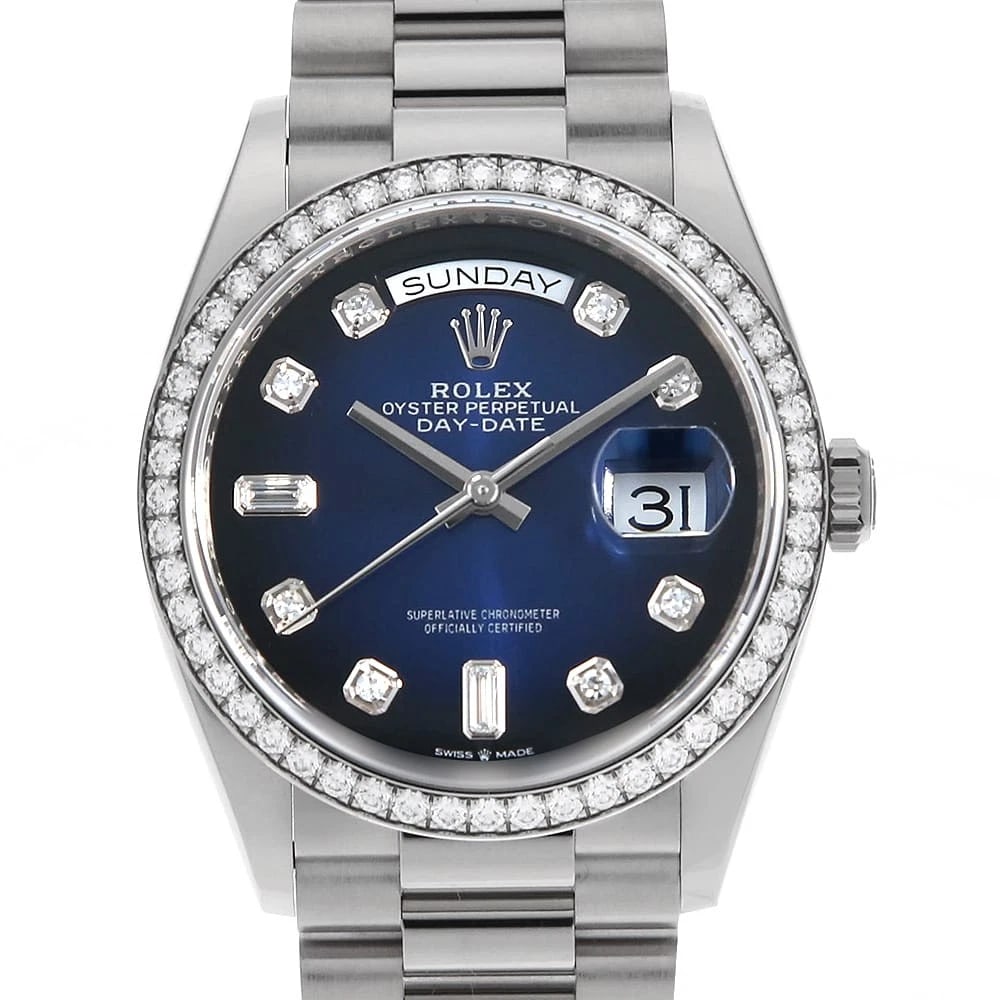ROLEX DATE BEZEL DIAMOND BAGUETTE WATCH: ROLEx Date Bezel Diamond Baguette Watch Brand: ROLEx Type/Style: Wrist watch Material: Band Material White Gold, Case Material White Gold Color: Dial Color Blue Size: Case:W36mm Circumference of
