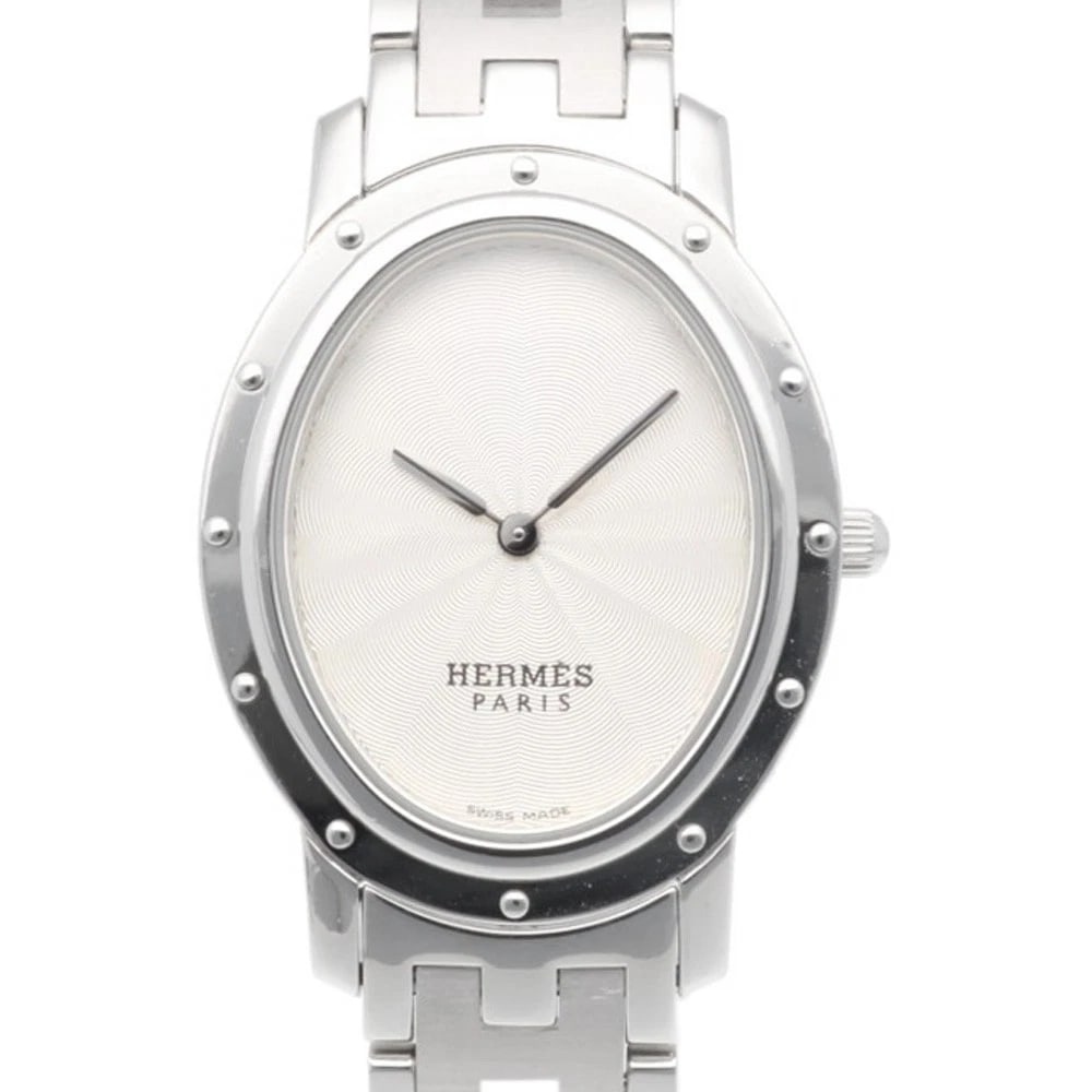 HERMES CLIPPER OVAL WATCHES STAINLESS STEEL POLISHED WATCH: HERMES Clipper oval Watches Stainless Steel Polished Watch Brand: HERMES Type/Style: Wristwatch Material: Stainless Steel Color: Silver / white Size: Case:W1.0inch x H1.5inch/ W26.0mm x H37.5mm Band L