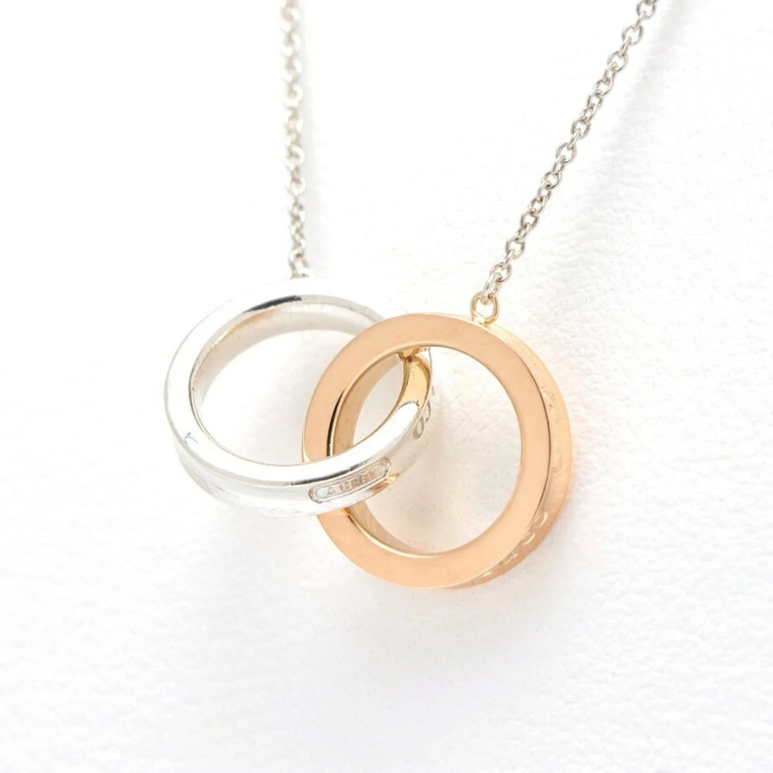 TIFFANY & CO. 1837 INTERLOCKING CIRCLE PENDANT NECKLACE: Tiffany & Co. 1837 Interlocking Circle Pendant Necklace Brand: Tiffany Type/Style: Pendant necklace Material: Pink gold (18K), Silver 925, Sterling silver, Color: Pink gold, Silver Size: Length: 40cm 
