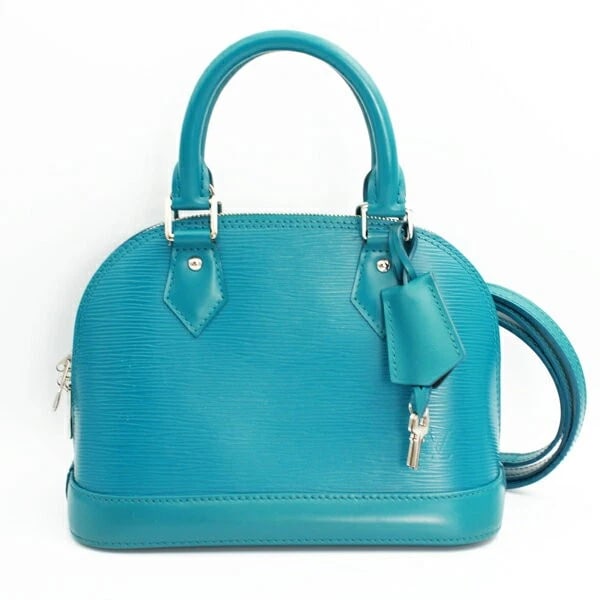 LOUIS VUITTON ALMA BB EPI CYAN BAG COMPACT: Louis Vuitton Alma BB Epi Cyan Bag Compact Brand: LOUIS VUITTON Type/Style: Please check the photos. Material: Epi Color: Cyan Size: Width 23.5 cm ? Height 17.5 cm ? Depth 11.5 cm Accessories: Non