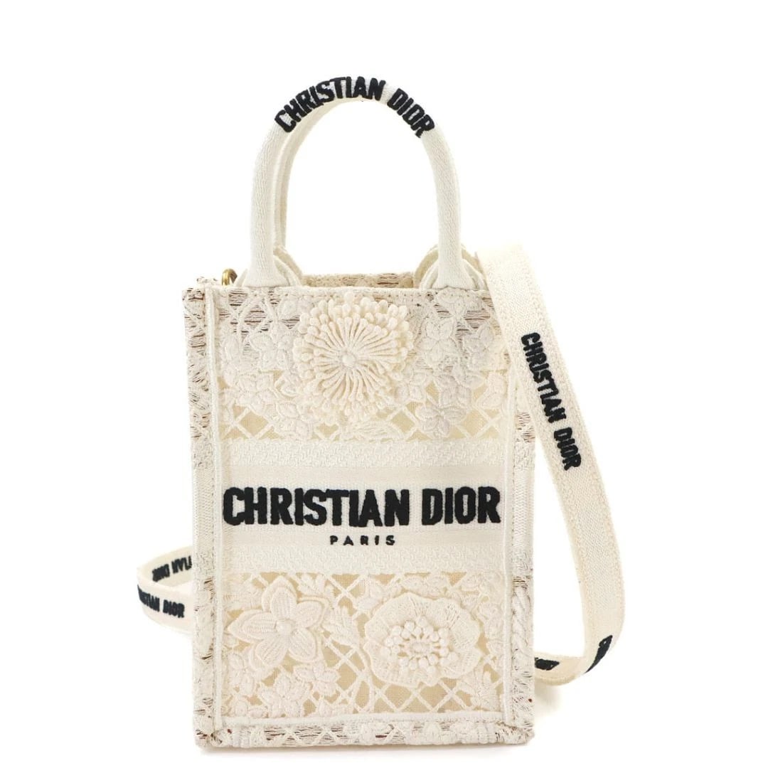 CHRISTIAN DIOR VERTICAL MINI BOOK TOTE CANVAS WHITE 2WAY SHOULDER BAG HANDBAG: Christian Dior Vertical Mini Book Tote Canvas White 2Way Shoulder Bag Handbag Brand: Dior Type/Style: Shoulder Bag Material: Canvas Color: White Size: W13 ? H18 ? D7.5 cm Accessories: None
