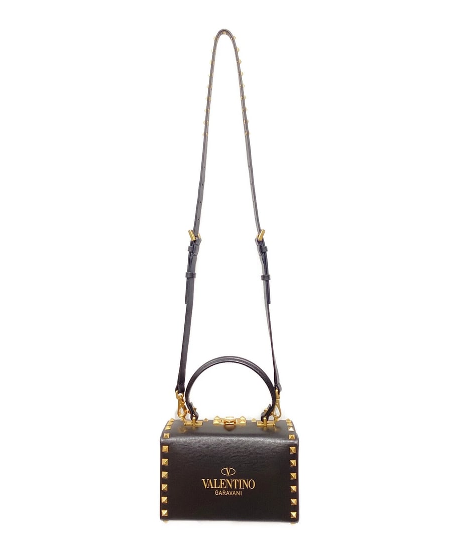 VALENTINO HANDLE BAG ROCKSTUD LOGO BOX TWO-WAY TOTE SHOULDER BAG: Valentino Handle Bag Rockstud Logo Box Two-Way Tote Shoulder Bag Brand: Valentino Type/Style: Top Handle Bag Material: None Color: Black Size: Height: 4.7 inches (12 cm) Width: 7.5 inches (19 cm) Dept