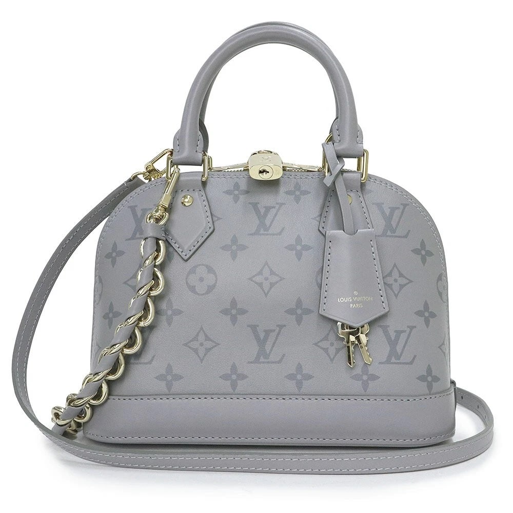 LOUIS VUITTON ALMA BB MONOGRAM INK LEATHER TRIANON GRAY: Louis Vuitton Alma BB Monogram Ink Leather Trianon Gray Brand: Louis Vuitton Type/Style: Shoulder Bag Material: Monogram Ink / Calfskin Leather Color: Trianon Grey / Gold Hardware Size: Approximately 