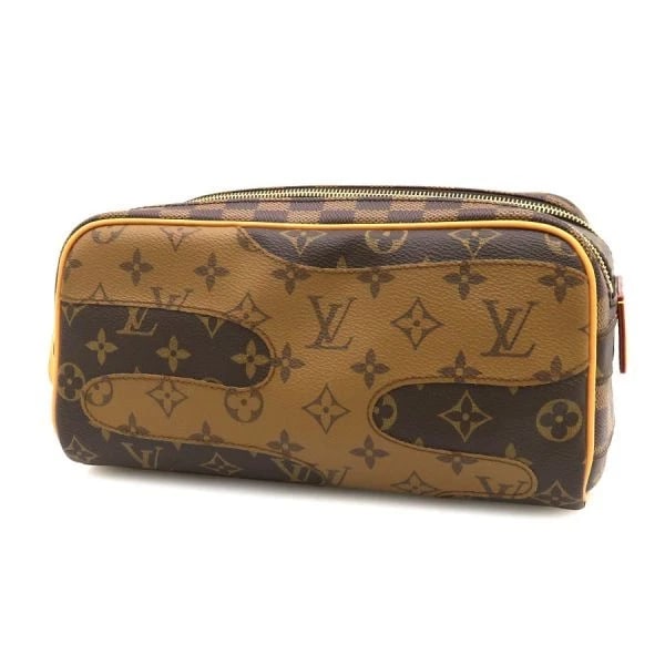 LOUIS VUITTON MONOGRAM DOPKIT HANDBAG CLUTCH MONOGRAM CANVAS: Louis Vuitton Monogram Dopkit Handbag Clutch Monogram Canvas Brand: LOUIS VUITTON Type/Style: Clutch Material: Monogram Reverse Canvas, Damier Color: Brown Size: W:26?H:13?D:15 Accessories: None <