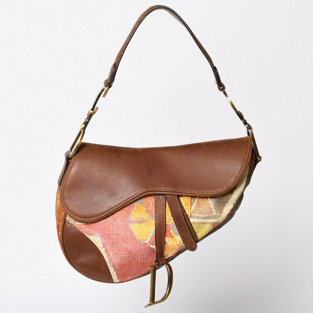 CHRISTIAN DIOR KILIM SADDLE BAG: Christian Dior Kilim Saddle Bag Brand: Dior Type/Style: Shoulder Bag Material: Canvas, Leather Color: Brown, Multicolor Size: Approximately W 25cm x H 19cm x D 5cm (W 9.8inch x H 7.5inch x D 2inch)