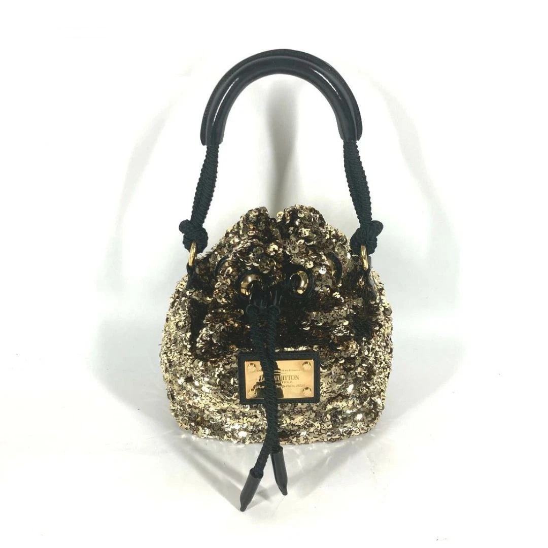 LOUIS VUITTON CRUISE MINI NOE ROCOCO SEQUIN LEATHER BAG: LOUIS VUITTON Cruise Mini Noe Rococo Sequin Leather Bag Brand: Louis Vuitton Type/Style: Shoulder Bag Material: Sequin / Leather Color: Gold x Black Size: W 17cm x H 19.5cm x D 13cm (width measured at