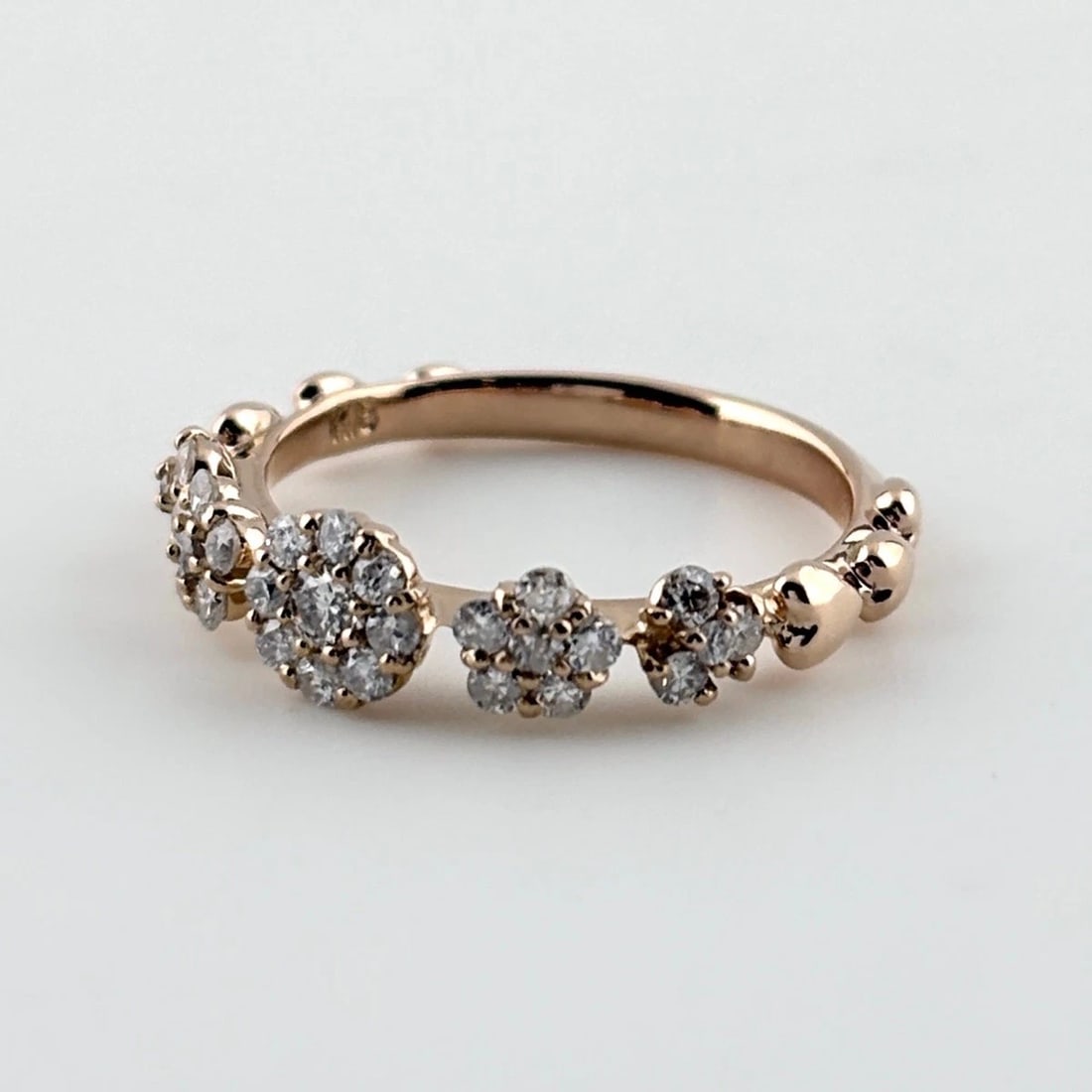 MELEE DIAMOND DESIGN RING PG RING: Melee Diamond Design Ring Pg Ring Brand: Unbranded Type/Style: Ring Material: 18K PG, Main Stone Natural Color: PG Size: US5 Accessories: None Accessories Notice: When purchasing pre-owned