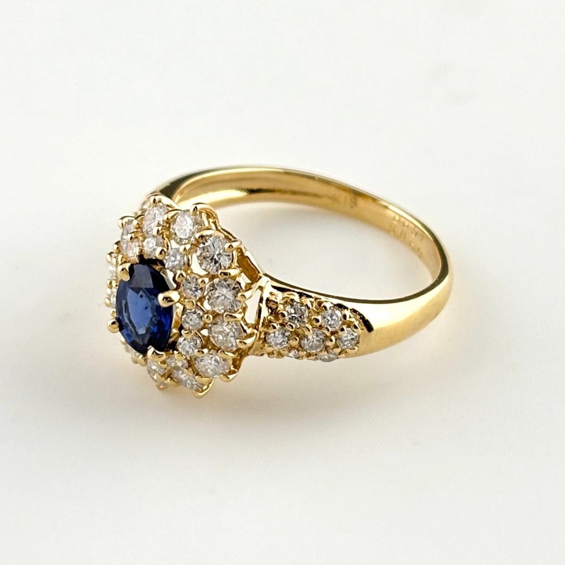SAPPHIRE DESIGN RING YG RING MELEE DIAMOND RING: Sapphire Design Ring Yg Ring Melee Diamond Ring Brand: Unbranded Type/Style: Ring Material: 18K YG, Main Stone Sapphire /Secondary Stone:Natural Color: YG Size: US6 to 6.5 Accessories: None