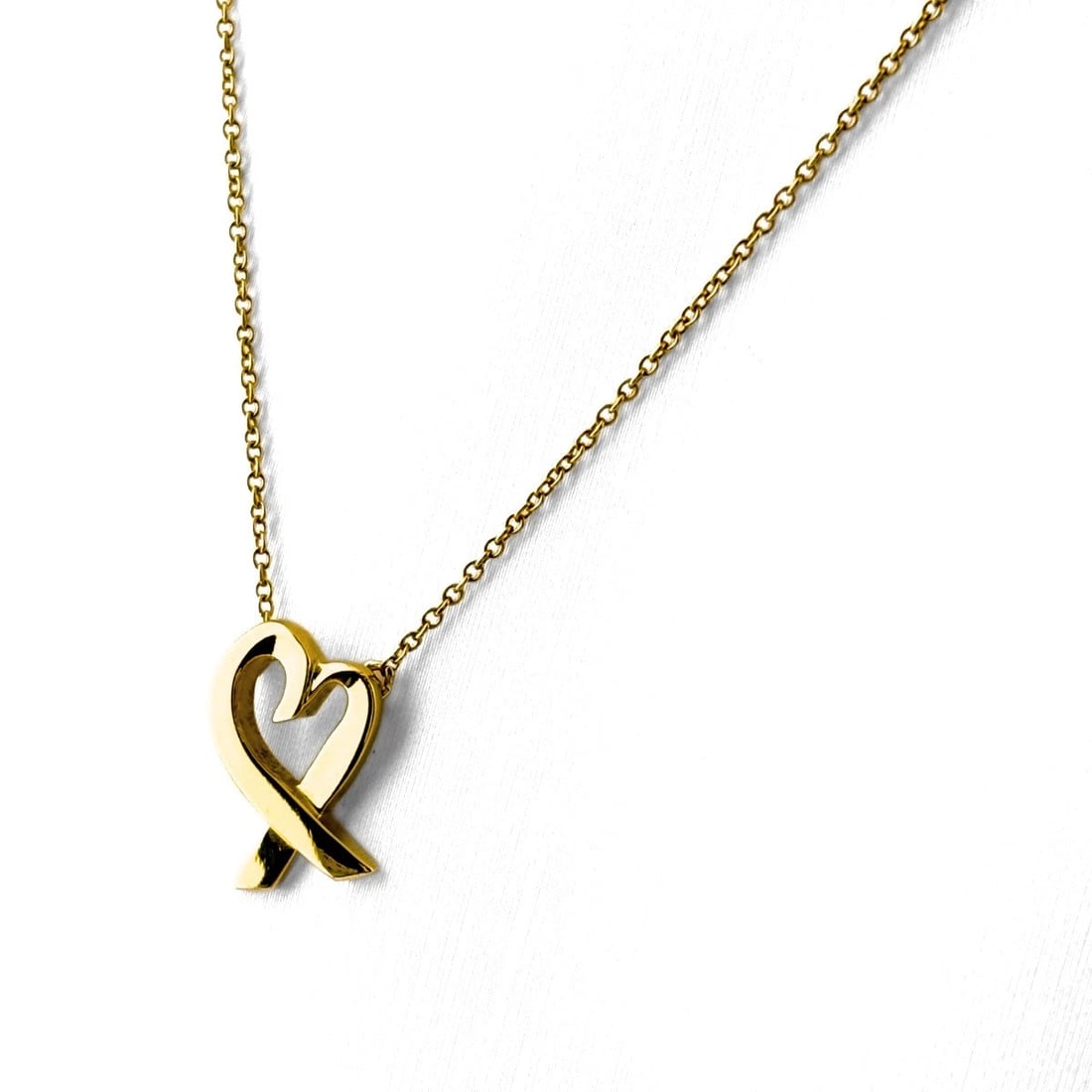 TIFFANY&CO. LOVING HEART NECKLACE YG NECKLACE 750: Tiffany&Co. Loving Heart Necklace Yg Necklace 750 Brand: TIFFANY&Co. Type/Style: Necklace Material: 750YG, Main Stone None Color: YG Size: 14.8x10.0mm(0.6") Accessories: None Accessories N