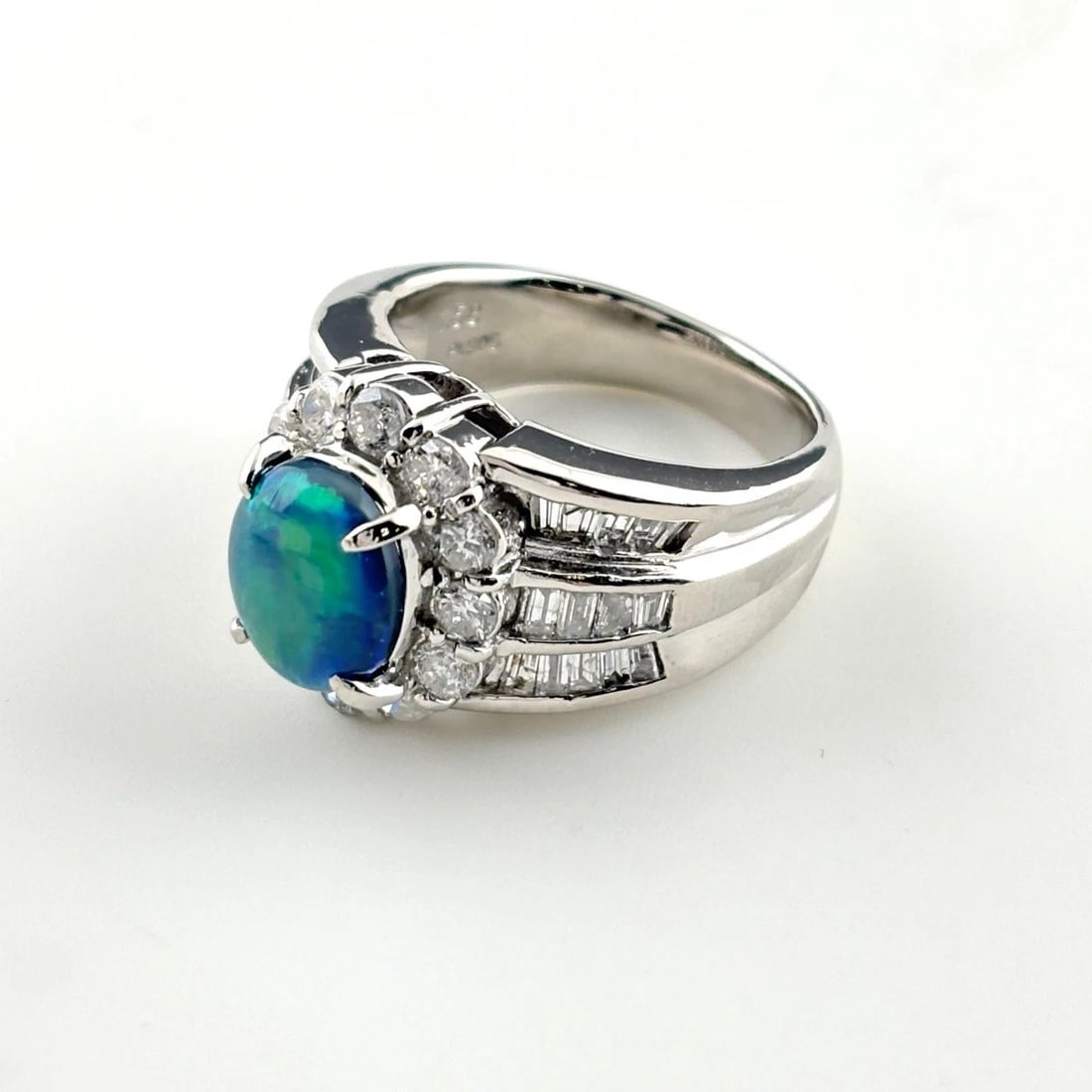 BLACK OPAL DESIGN RING PLATINUM MELEE DIAMOND RING: Black Opal Design Ring Platinum Melee Diamond Ring Brand: Unbranded Type/Style: Ring Material: Pt900, Main Stone Opal /Secondary Stone:Natural Color: None Size: US6.5 Accessories: None Acc