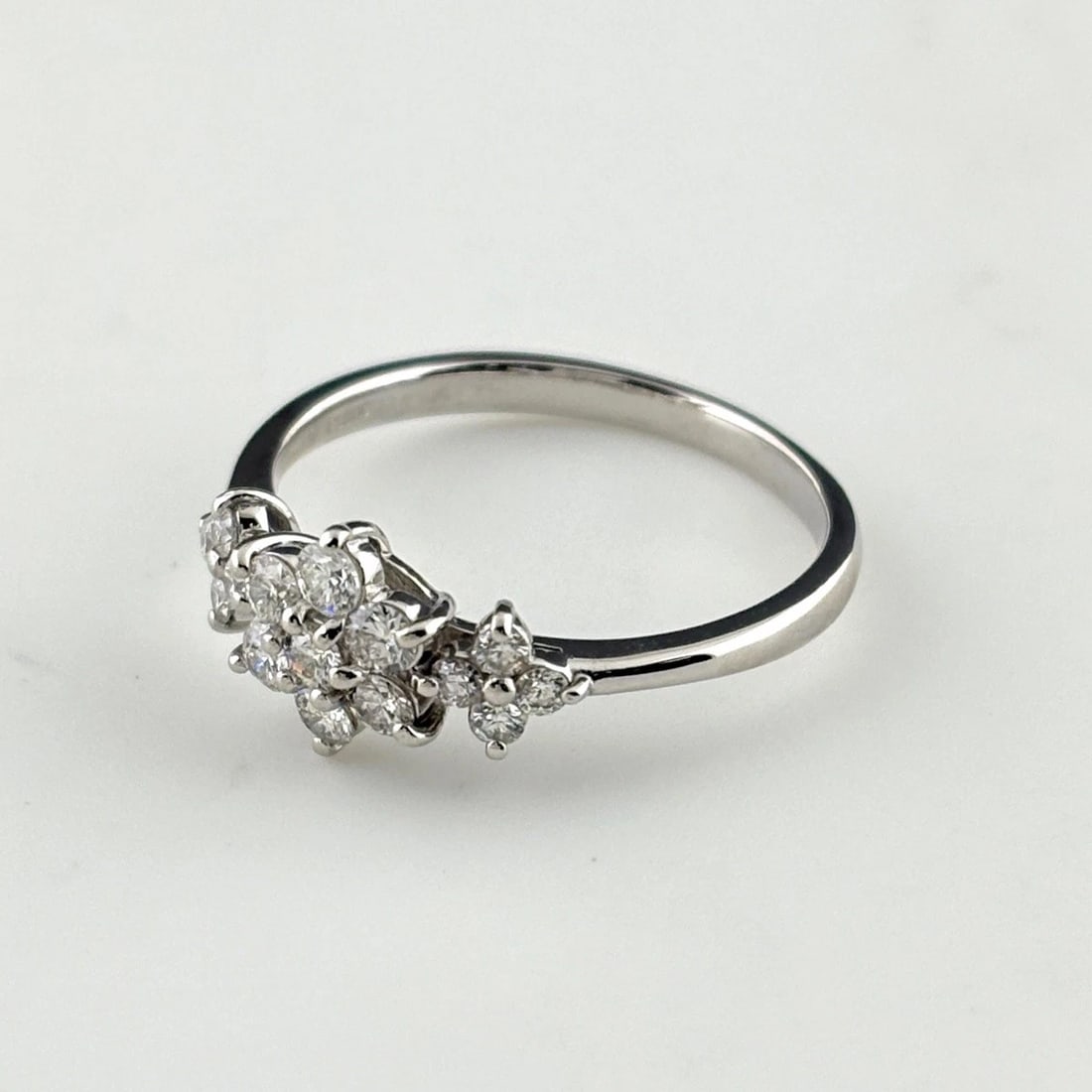 MELEE DIAMOND DESIGN PLATINUM RING: Melee Diamond Design Platinum Ring Brand: Unbranded Type/Style: Ring Material: Pt900, Main Stone Natural Color: None Size: US6.5 Accessories: None Accessories Notice: When purchasing pre-owned goods,