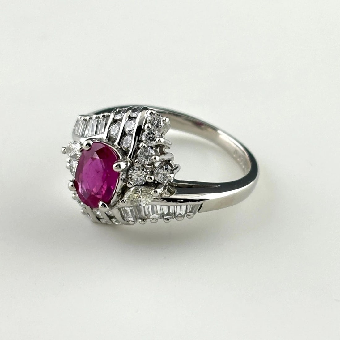 RUBY DESIGN RING PLATINUM RING MELEE DIAMOND RING: Ruby Design Ring Platinum Ring Melee Diamond Ring Brand: Unbranded Type/Style: Ring Material: Pt900, Main Stone Ruby /Secondary Stone:Natural Color: None Size: US6 to 6.5 Accessories: None