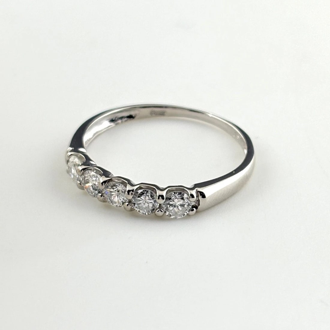 MELEE DIAMOND DESIGN PLATINUM RING DIAMOND: Melee Diamond Design Platinum Ring Diamond Brand: Type/Style: Ring Material: Pt900, Main Stone Natural Color: None Size: US7 to 7.5 Accessories: None Accessories Notice: When purchasing pr
