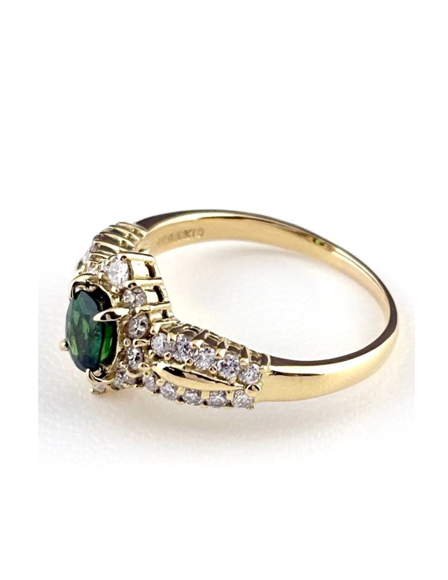 TOURMALINE DESIGN RING YG MELEE DIAMOND RING: Tourmaline Design Ring Yg Melee Diamond Ring Brand: Unbranded Type/Style: Ring Material: 18K YG, Main Stone Tourmaline /Secondary Stone:Natural Color: YG Size: US7.5 to 8 Accessories: None