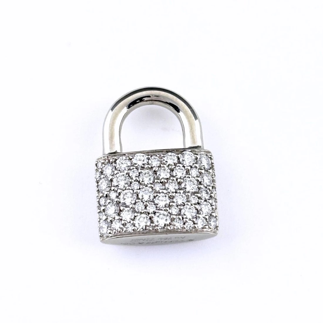 TIFFANY&CO. HARDWARE LOCK MELEE DIAMOND PENDANT HEAD: Tiffany&Co. Hardware Lock Melee Diamond Pendant Head Brand: TIFFANY&Co. Type/Style: Pendant Head Material: 750, Main Stone Natural Color: None Size: 15.5x11.5mm(0.6") Accessories: None Accessories